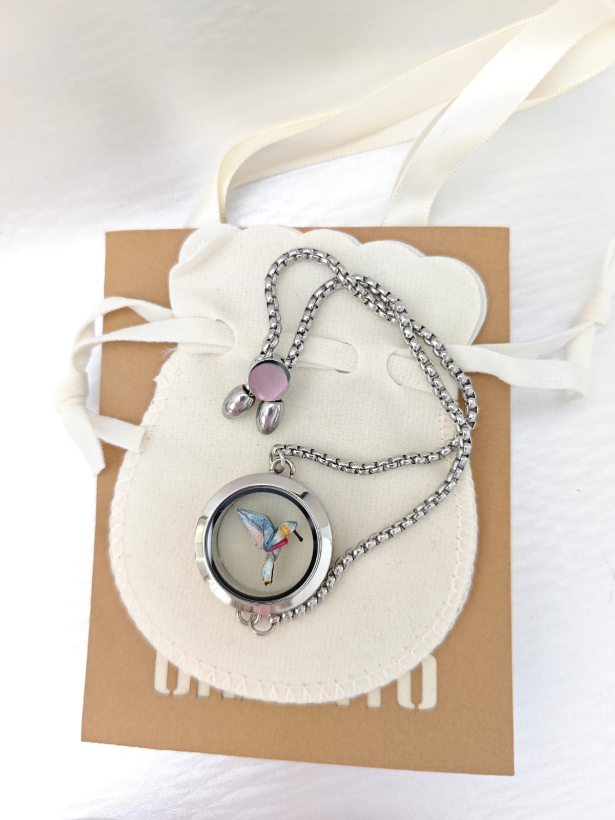 Pulsera relicario plateada