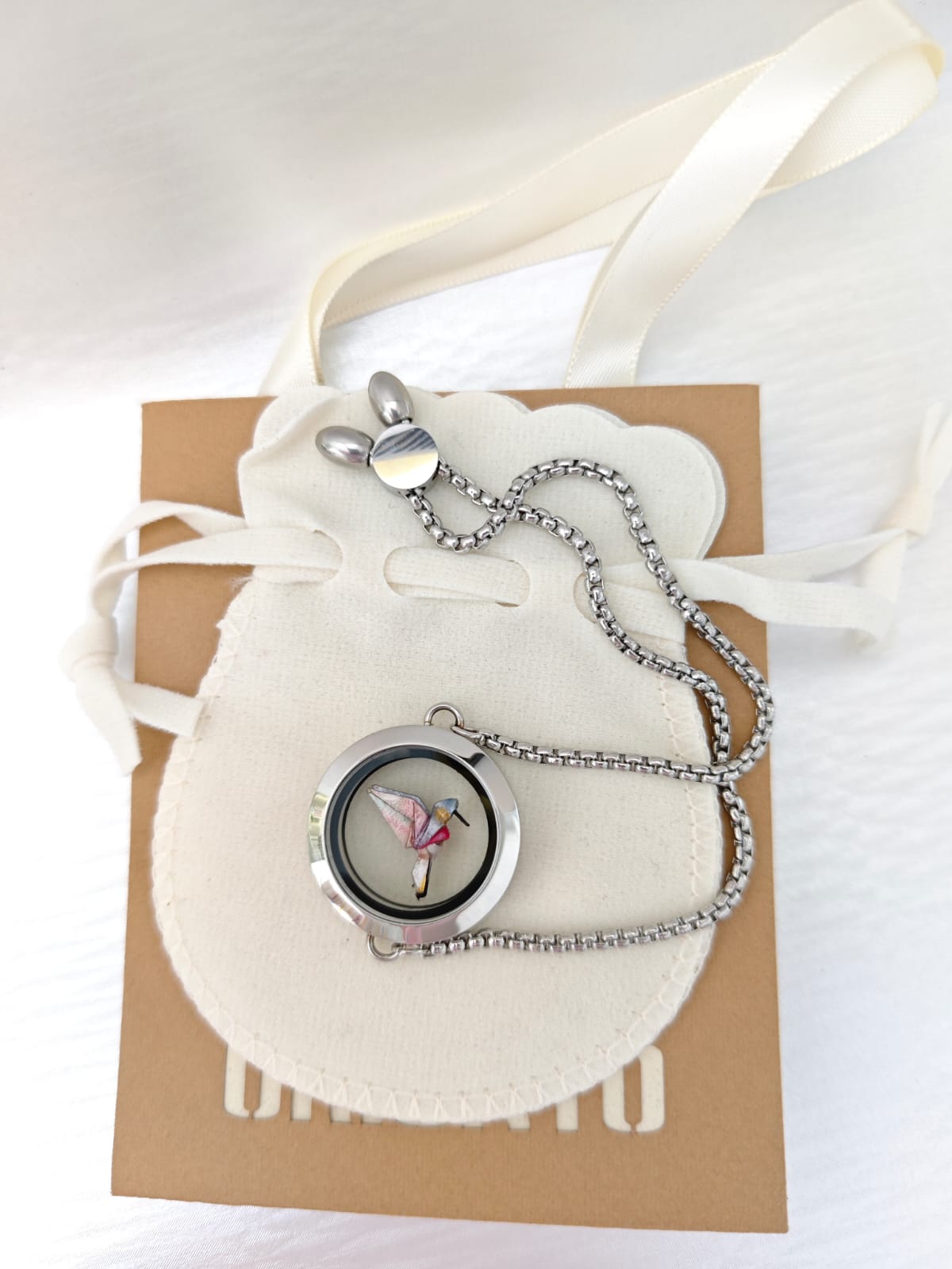 Pulsera relicario plateada