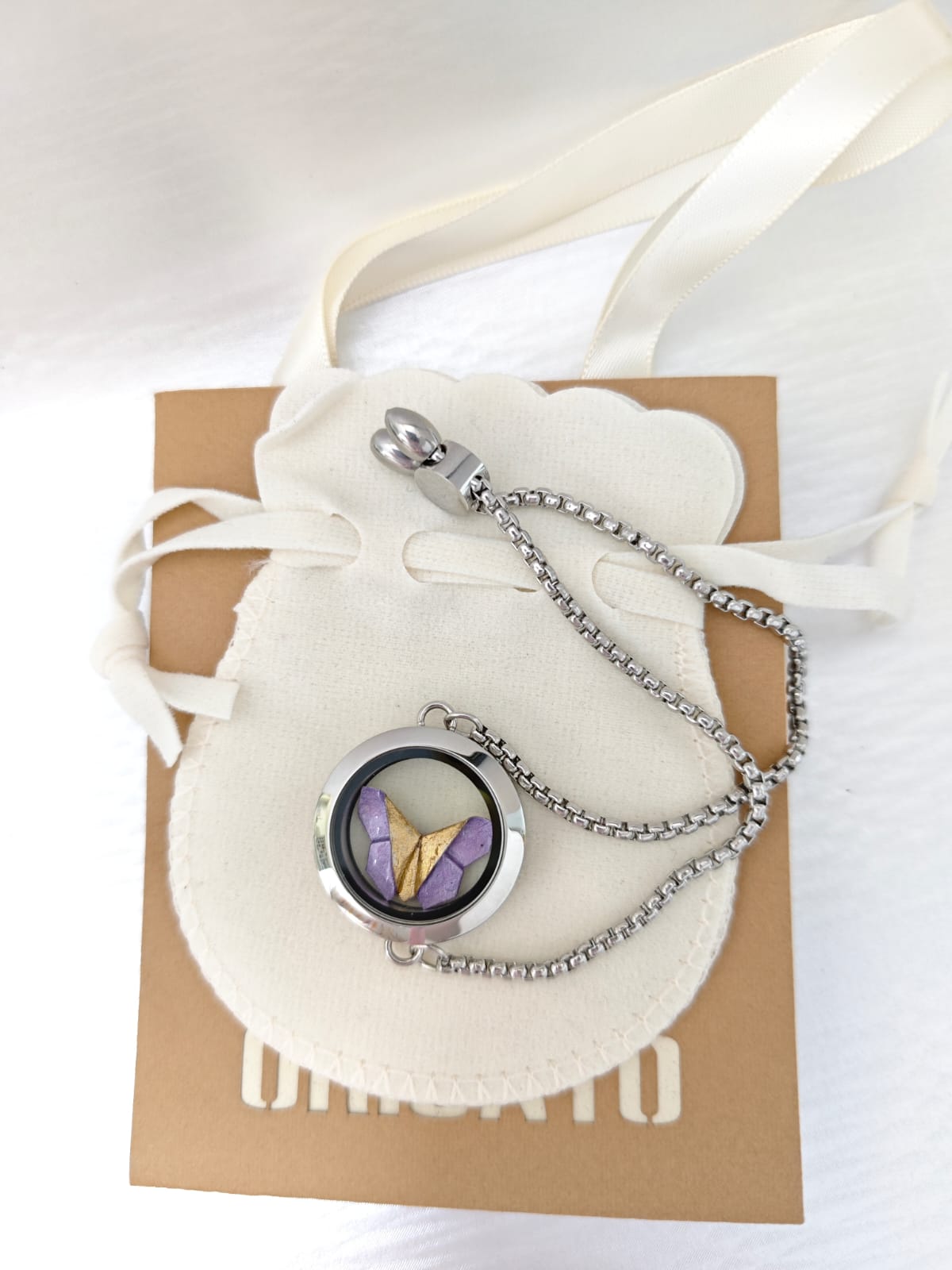 Pulsera relicario plateada