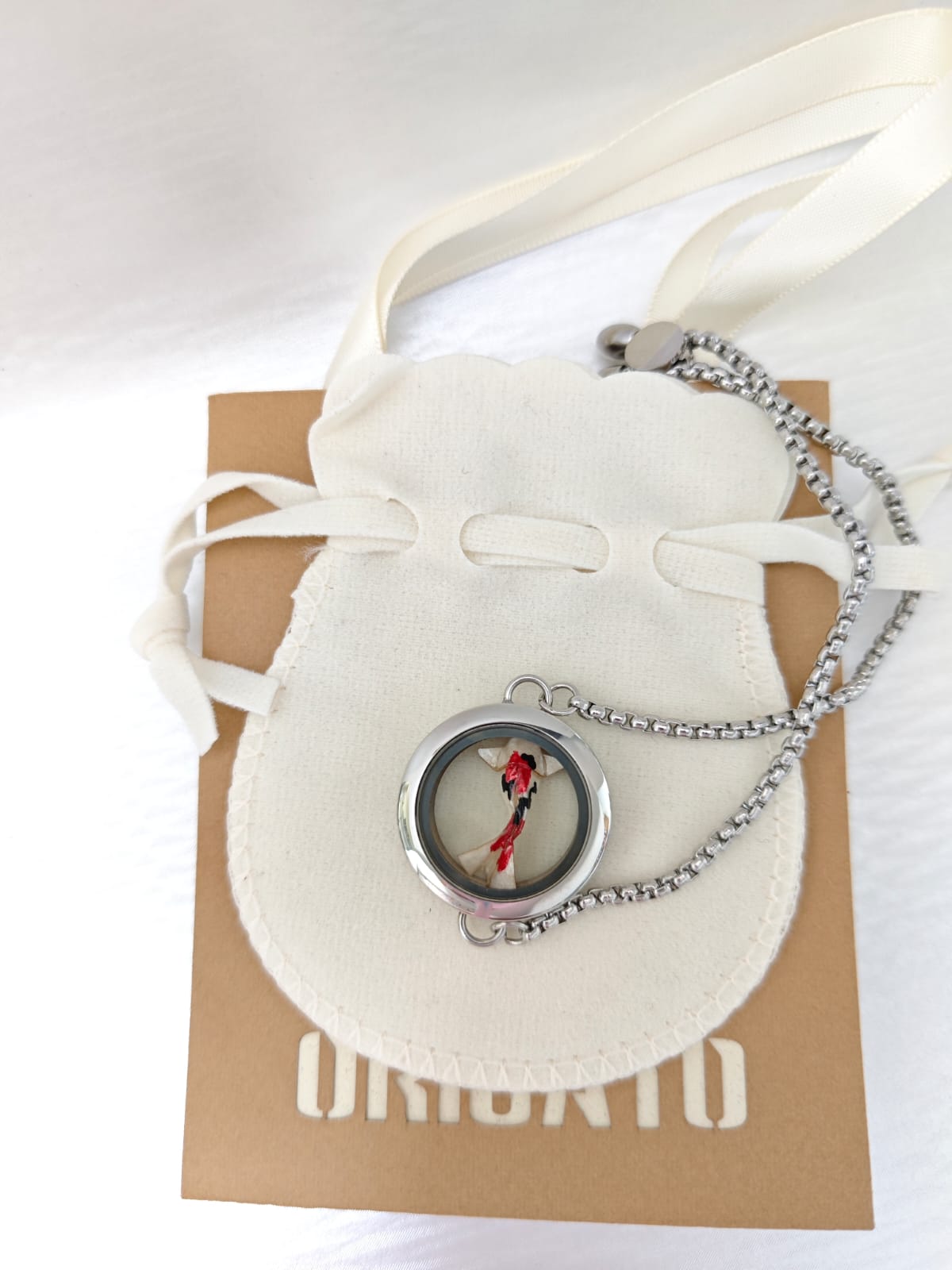 Pulsera relicario plateada