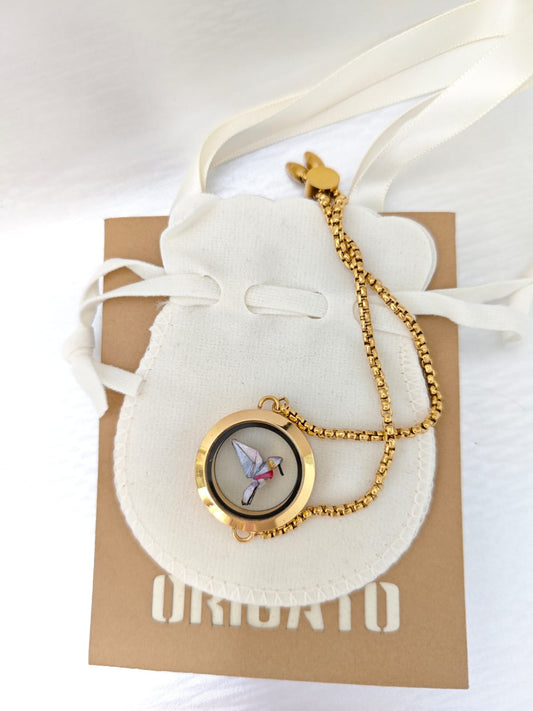 Pulsera relicario dorada