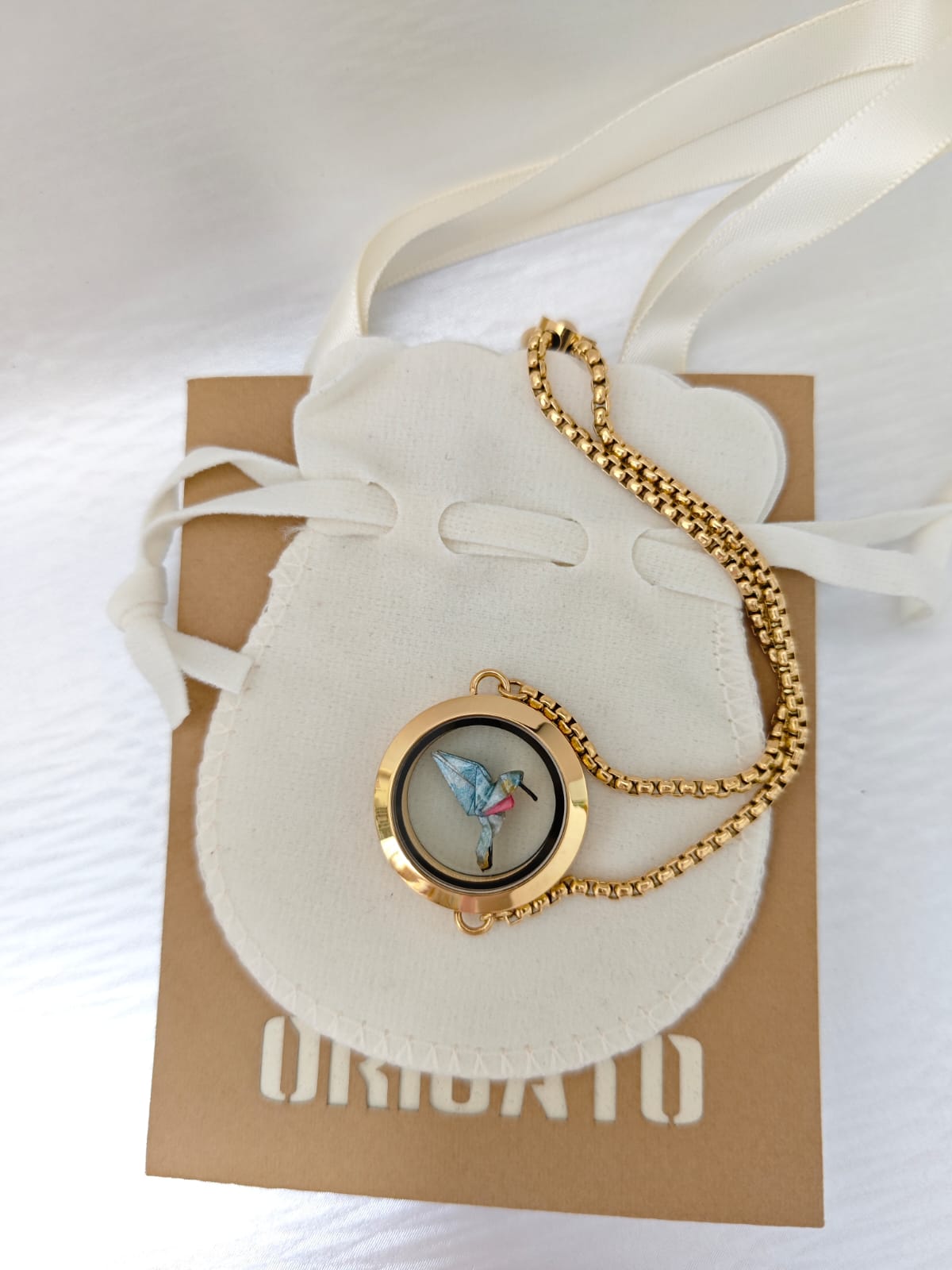 Pulsera relicario dorada